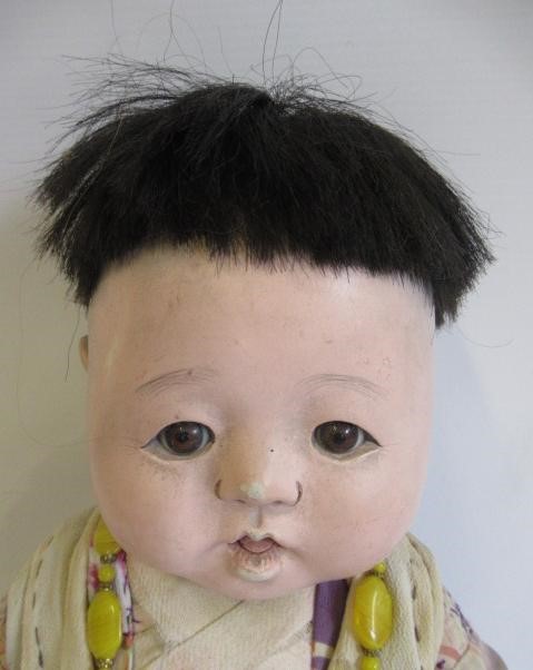 Five Japanese dolls, all with composition heads, fixed eyes and national dress (Est. plus 24% Image