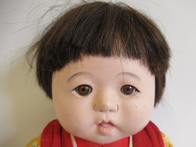 Five Japanese dolls, all with composition heads, fixed eyes and national dress (Est. plus 24% Image