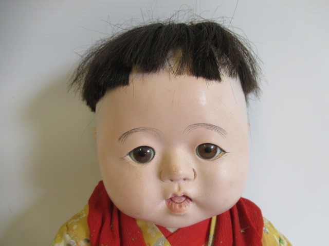 Five Japanese dolls, all with composition heads, fixed eyes and national dress (Est. plus 24% Image