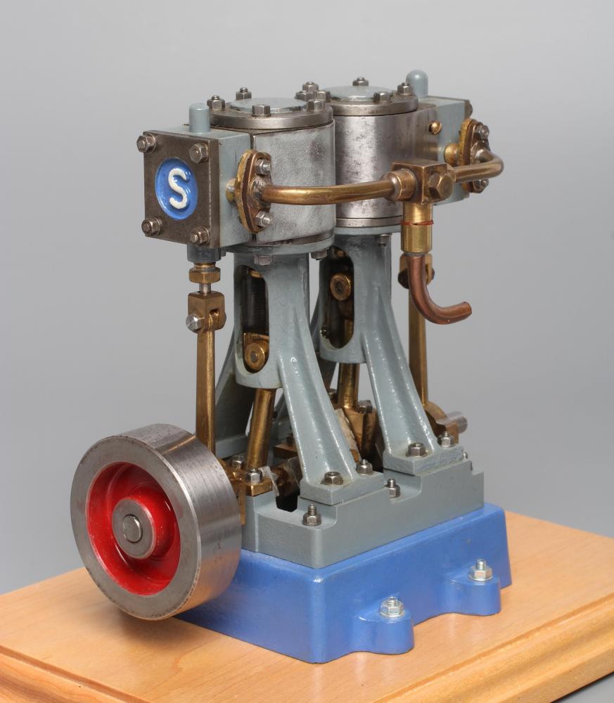 Stuart Turner V10 non-reversing twin cylinder vertical steam engine finished in grey and blue on Image