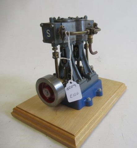 Stuart Turner V10 non-reversing twin cylinder vertical steam engine finished in grey and blue on Image
