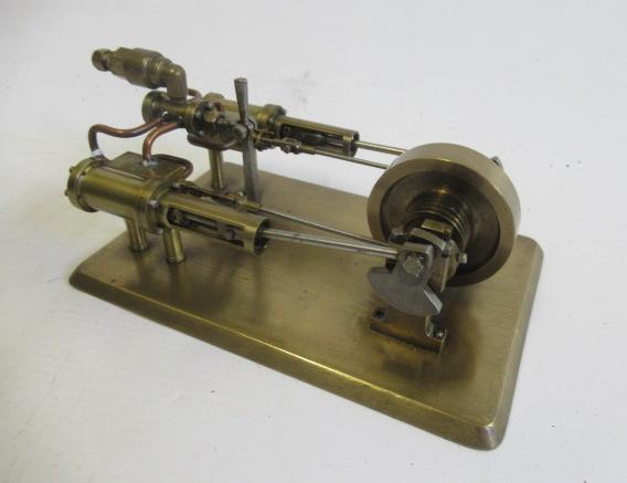 A twin cylinder horizontal steam engine of fabricated brass construction with reversing valve on Image