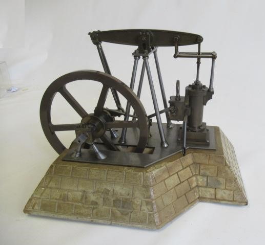 An unusual beam engine model with "A" frame beam support and flywheel bearing support Image