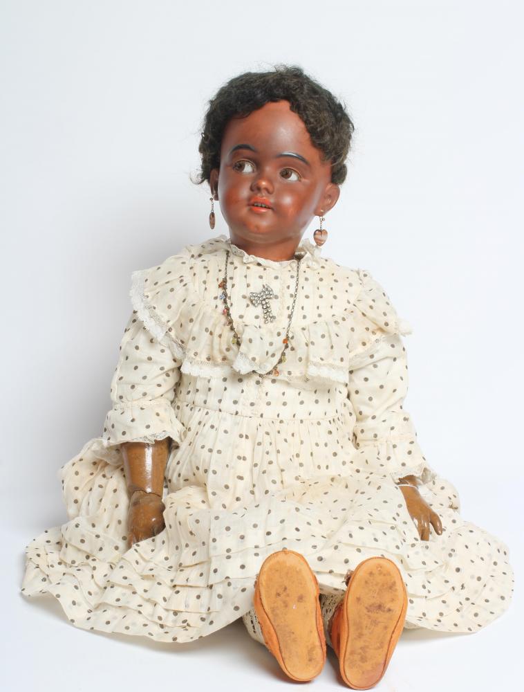 A Simon & Halbig bisque socket head flirty doll Image