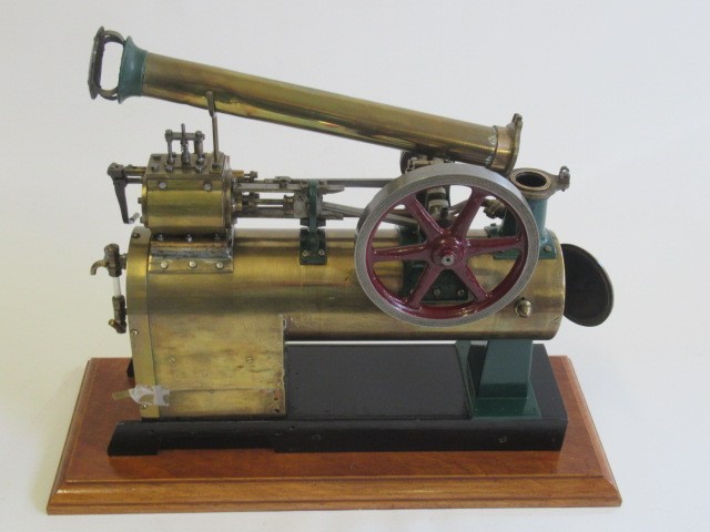 A locomotive boiler over type single cylinder steam engine Image