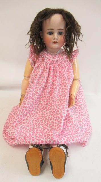 A Schoenau & Hoffmeister bisque socket head doll Image