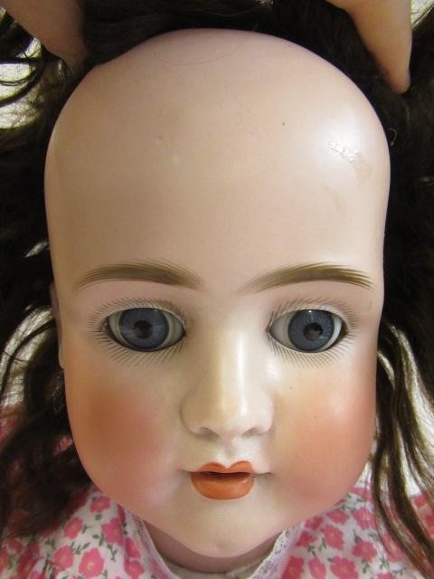 A Schoenau & Hoffmeister bisque socket head doll Image