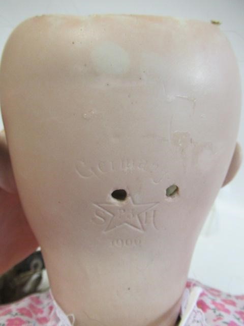 A Schoenau & Hoffmeister bisque socket head doll Image