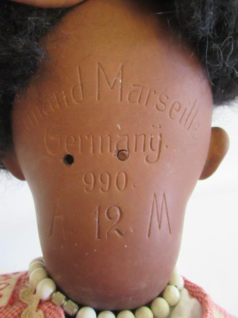 An Armand Marseille character doll Image