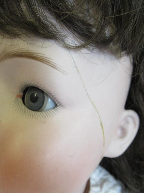 Two restored Gebruder Heubach bisque socket head dolls Image