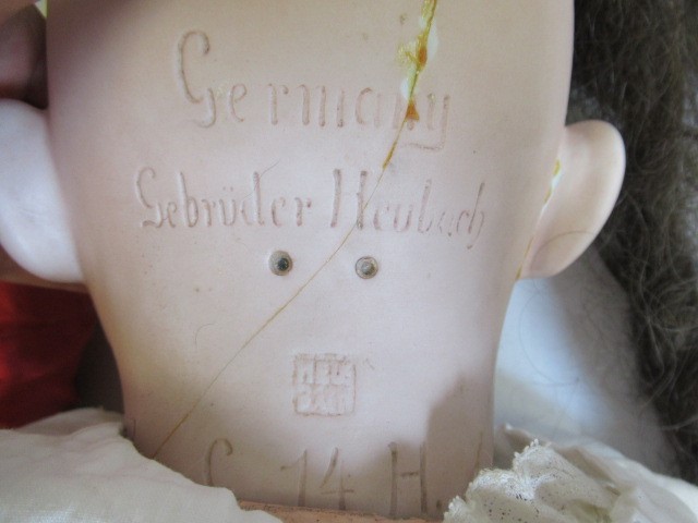 Two restored Gebruder Heubach bisque socket head dolls Image