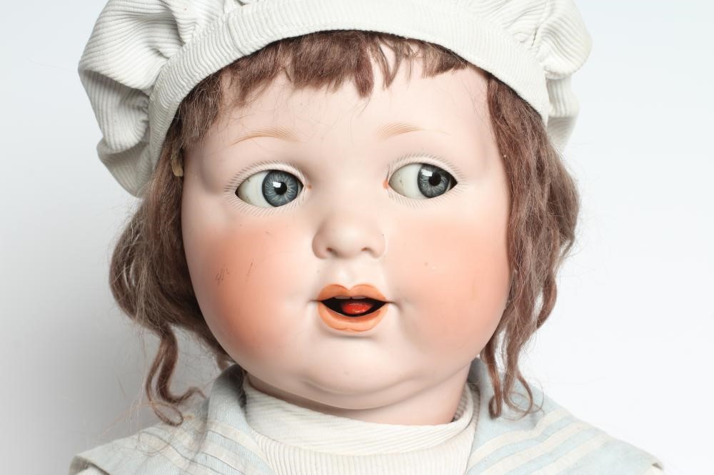 A clockwork Armand Marseille bisque head character doll Image