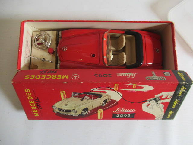 Schuco 2095 Mercedes 190SL with remote steering finished in red with accessories, box G, model G-E Image