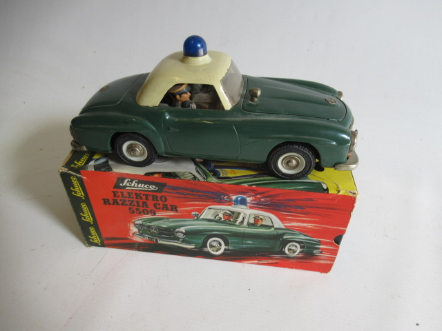 Schuco 5509 Electro Razzia battery powered Police Mercedes 190SL finished in green/white, some minor Image
