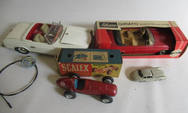 Schuco 5307 Mercedes 230SL in white with remote steering Image