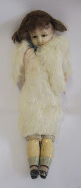 A Victorian wax head doll, with brown glass fixed eyes, closed mouth, composition lower limbs, Image