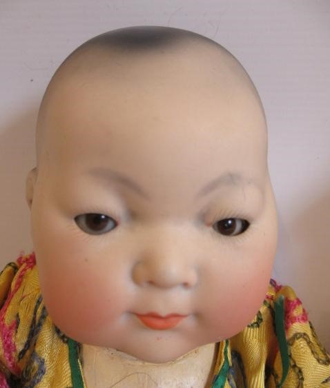 Two Armand Marseille Japanese bisque socket head dolls Image