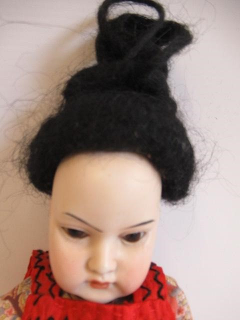 Two Armand Marseille Japanese bisque socket head dolls Image