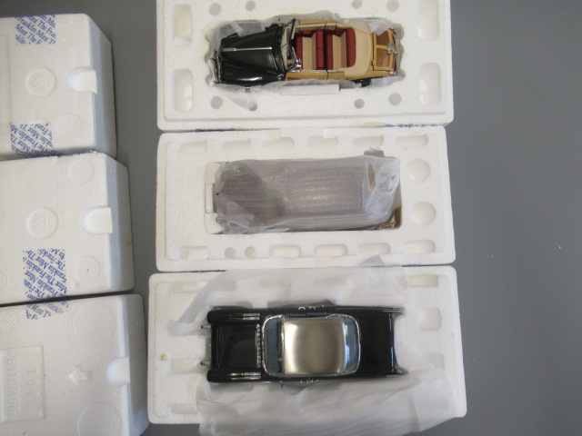 Franklin Mint 1957 Cadillac Elderado Brougham, 1949 Ford Woody wagon and 1948 Chrysler Town Car, all Image
