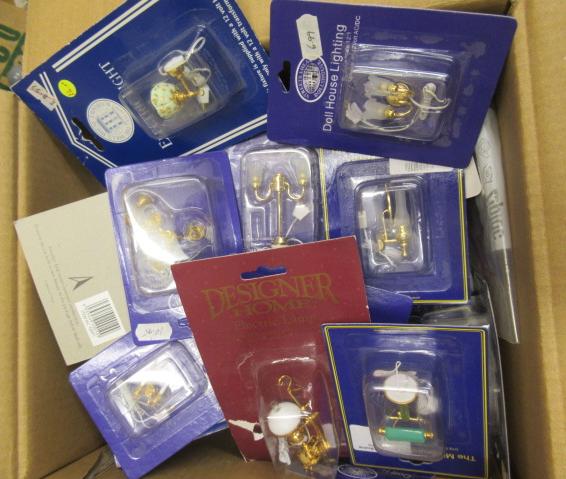 Twenty three dolls house light fittings in original unopened packaging and 6 others that are Image