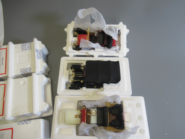 Franklin Mint Stanley Steamer, 1903 Ford A and 1913 Ford Model T, all items boxed, E-M (Est. plus Image