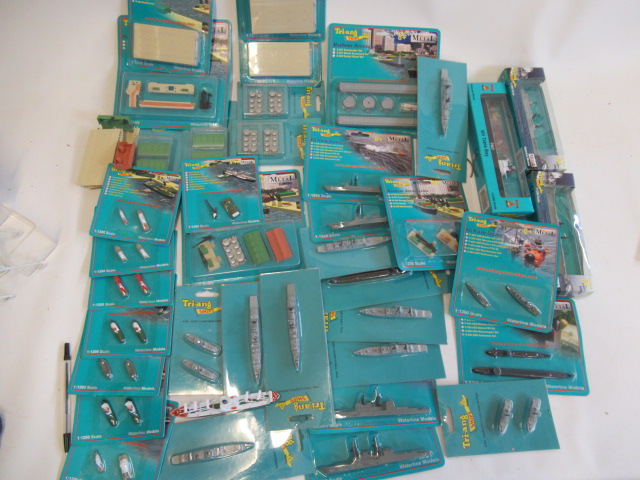 Large quantity of late issue Triang Minic ship models, most items military type, and some quay side Image