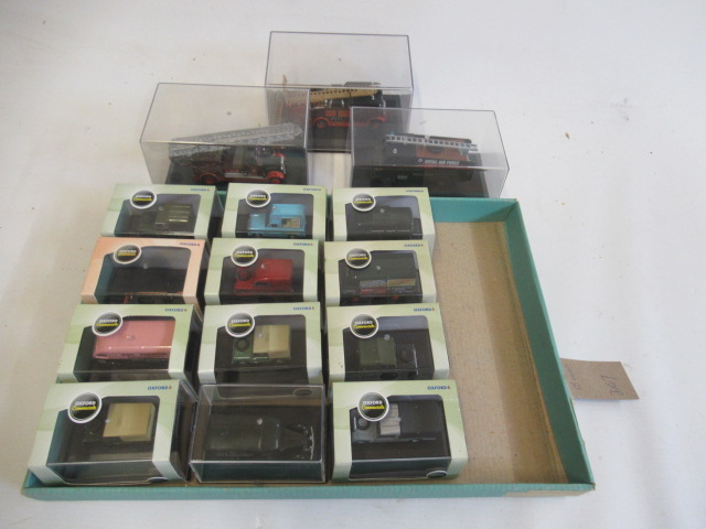 Fifteen Oxford commercials OO scale models including three fire engines, all items boxed E (Est. Image