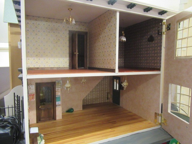 An apothecary shop dolls house, with lazy susan style rotating base and three seperate hinged Image