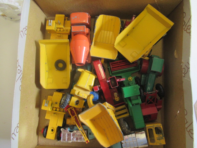 Unboxed Matchbox vehicles, most items construction vehicles including cement mixer, dump trucks, Image