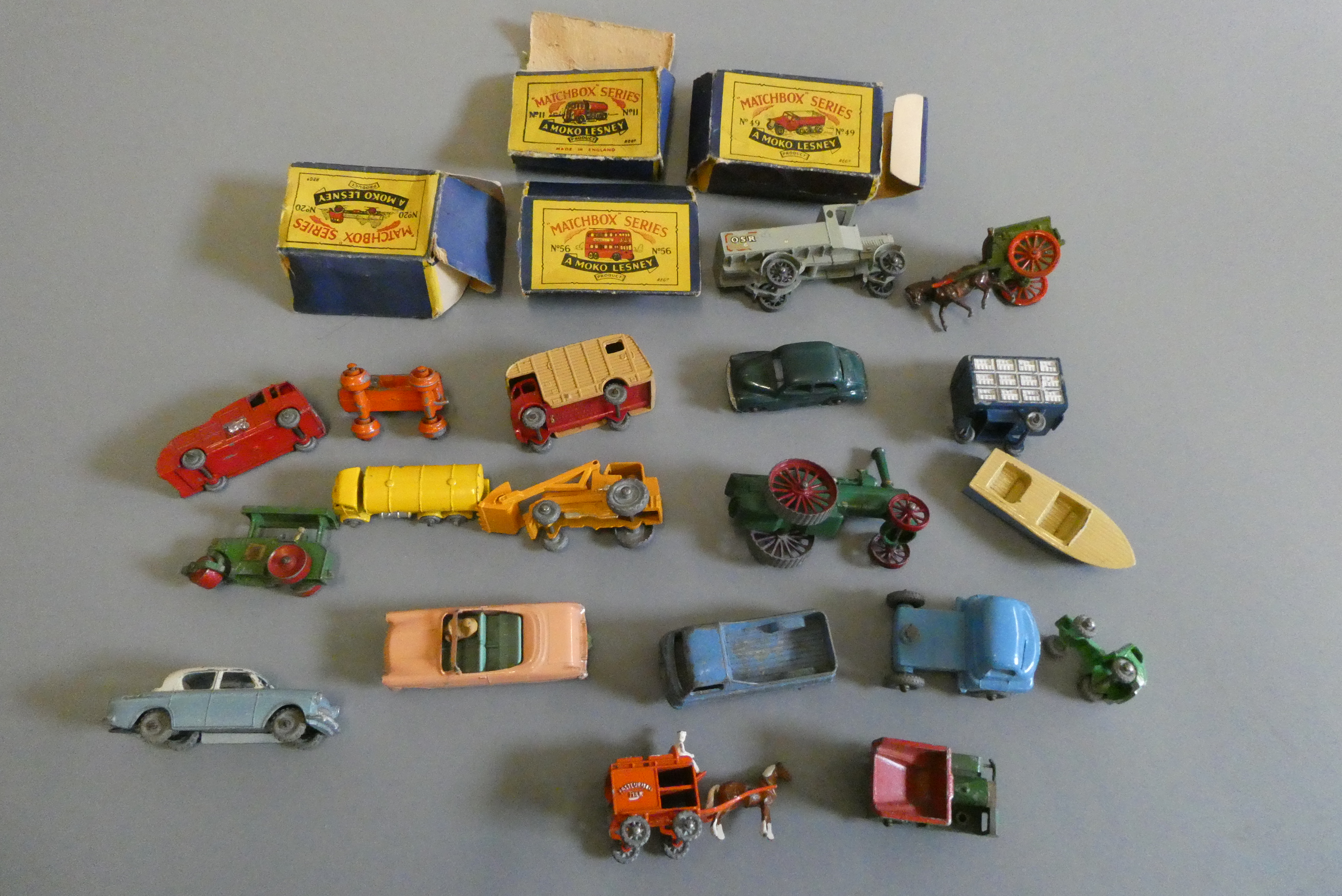 Unboxed Matchbox vehicles including Ford Zodiac, yellow tanker, Morris Minor and traction engine and Image