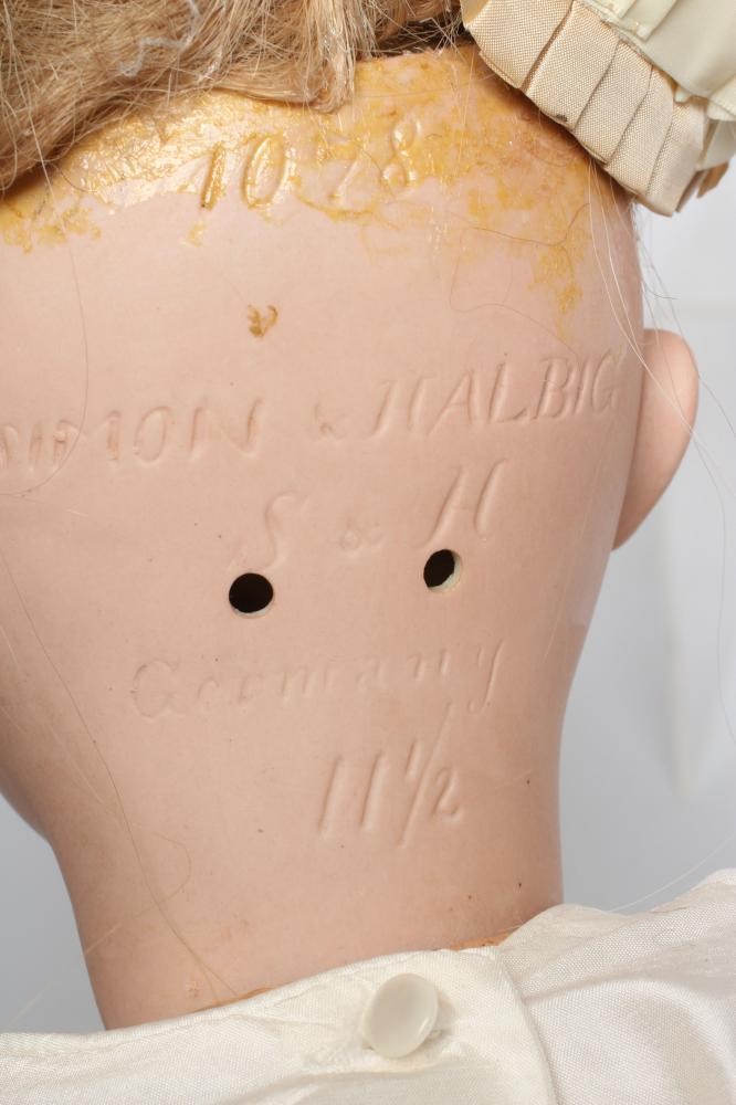 A Simon & Halbig bisque socket head doll Image