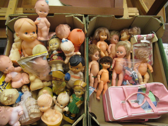 A box of Amanda Jane dolls, comprising seven dolls, a chair, carry cot and associated clothing, Image