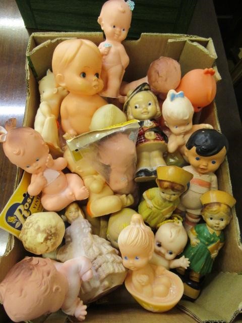 A box of Amanda Jane dolls, comprising seven dolls, a chair, carry cot and associated clothing, Image