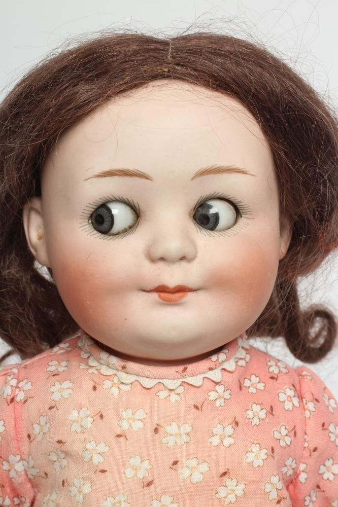 A Gebruder Heubach googly eye bisque socket head doll Image