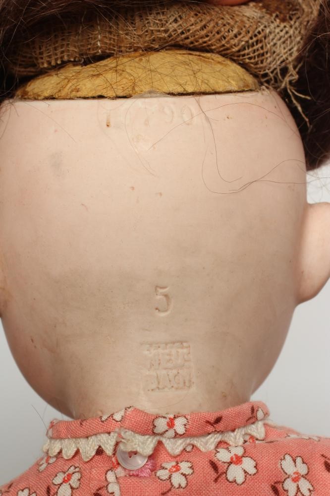 A Gebruder Heubach googly eye bisque socket head doll Image