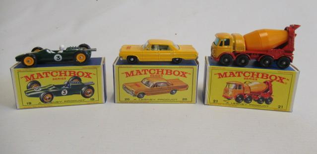 Matchbox 19d Lotus race car, box M, model M, 20c Chevrolet Impala Taxi, box M, model M, and 21d Image