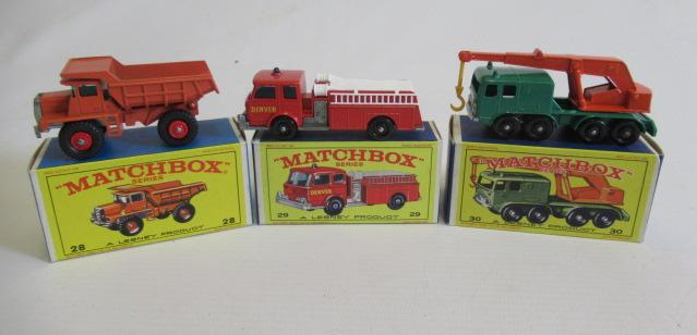 Matchbox 28d Mack Dump Truck, box M, model M, 29c Fire Pump Truck, box M, model M and 30c crane Image