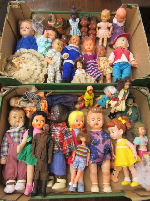 Two trays of mixed vintage dolls and figures, including celluloid, plastic, composition and vinyl Image