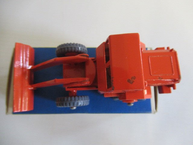 Matchbox 69b Hatra Tractor Shovel, box M, model M, orange body and hubs with grey wheels, small mark Image