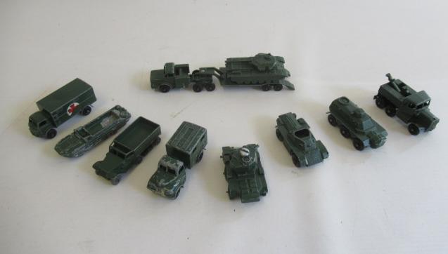 Ten unboxed Matchbox 1-75 army vehicles including tank transporter, crane truck and tank, F-P (Est. Image