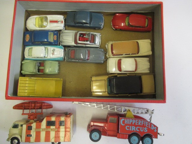 Unboxed Corgi vehicles including circus crane, airfield radar, James Bond's Aston Martin and Image