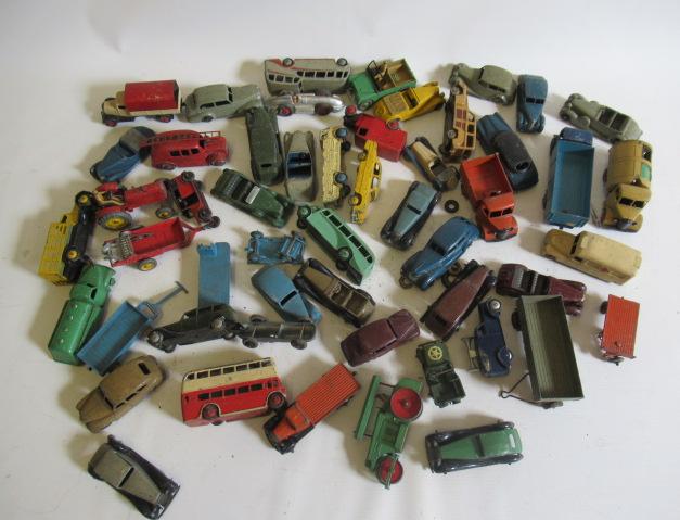 Playworn Dinky vehicles including lorries, car, buses and farm equipment, P (Est. plus 24% premium Image