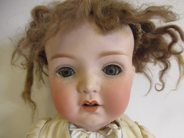 A Heubach bisque socket head doll Image