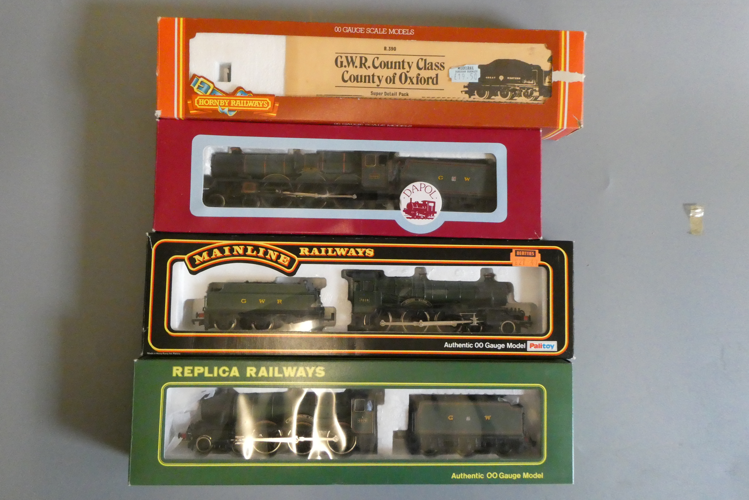 Four G.W.R. locomotives comprising Replica Railways 6976 Graythwaite Hall Mainline 7819 Hinton Manor Image
