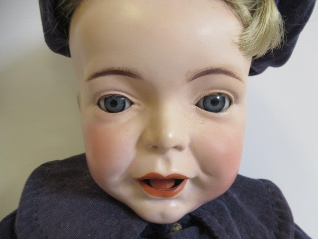 A restored S.F.B.J. bisque head character boy doll Image