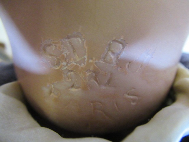 A restored S.F.B.J. bisque head character boy doll Image