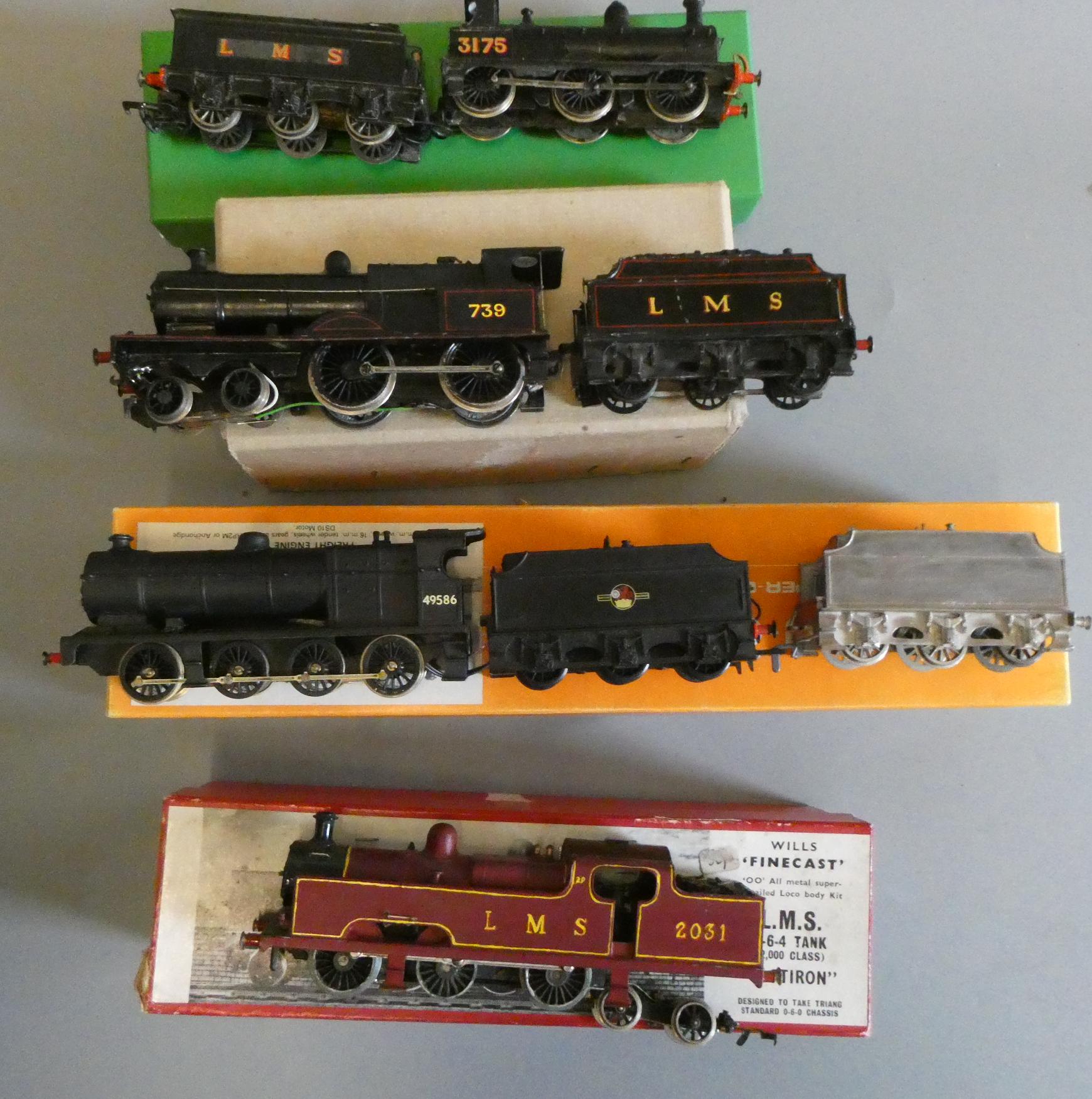 Four kit built locomotives comprising L.M.S. 2031 0-6-2T, B.R. 7F 0-8-0, L.M.S. 4-4-0 SP and MR Image