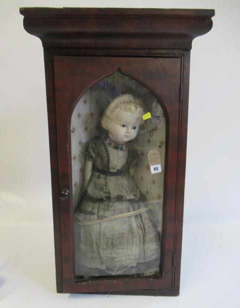 A wax head doll Image