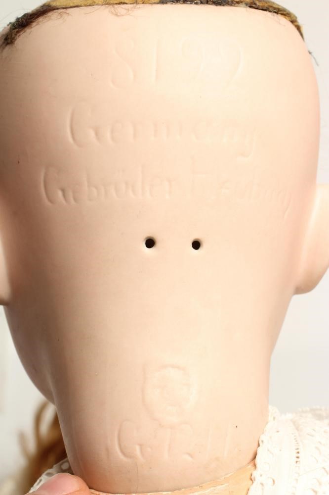 A Gebruder Heubach bisque socket head doll Image