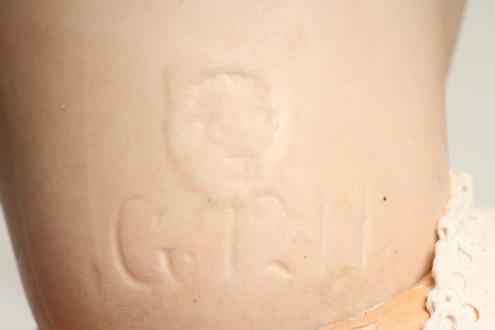 A Gebruder Heubach bisque socket head doll Image